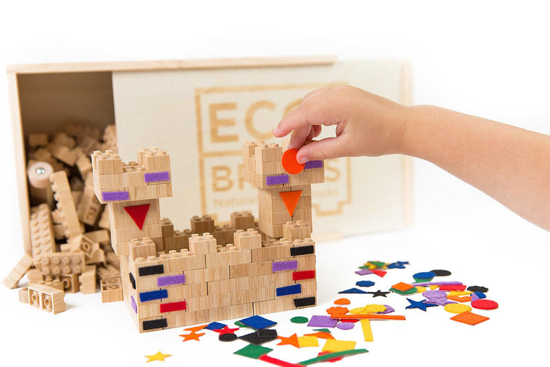 Eco-Bricks™ Bamboo 250-Piece set is a brilliant first step into healthier, greener, construction block fun. Eco-bricks™ Bamboo are natural and biodegradable bamboo construction blocks. Now Including Felt Stickers from 100% recycled water bottles. This allows more personalization to your builds!