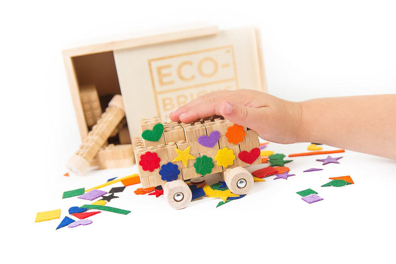 Eco-Bricks™ Bamboo 45-Piece set is a brilliant first step into healthier, greener, construction block fun. Eco-bricks™ Bamboo are natural and biodegradable bamboo construction blocks. Now Including Felt Stickers from 100% recycled water bottles. This allows more personalization to your builds!