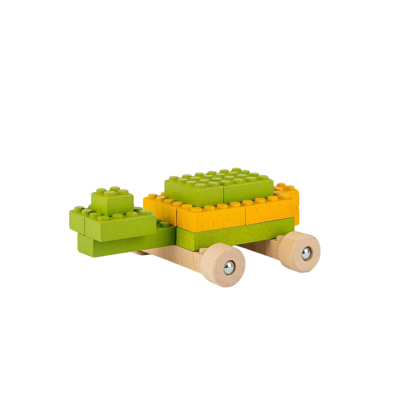 Once Kids Eco-Bricks™ Color made with water based color and biodegradable wooden construction blocks. The Eco-Bricks™ Color 54-piece set is made from Non-Toxic Water-Base Color, a brilliant first step into healthier, greener, construction block fun! Building Construction toy